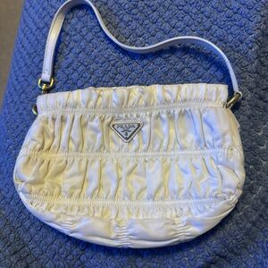 Prada in an off white color